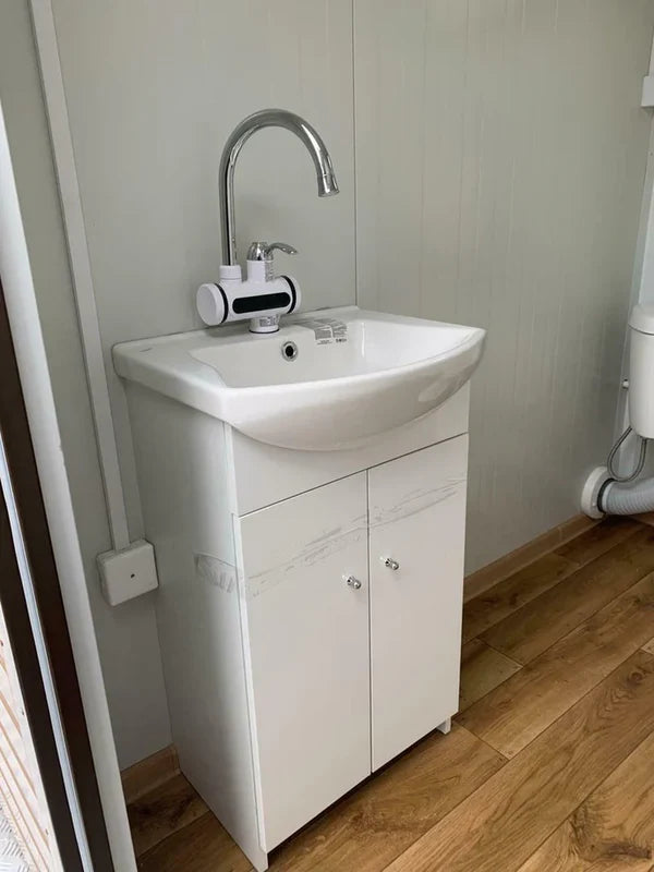 Dubbele sanitaire container met afvalwatertank